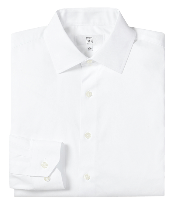 White dress shirt folded flat, showing spread collar and button placket.