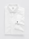 White fly-front tuxedo shirt folded flat, showing covered placket and black cufflink.