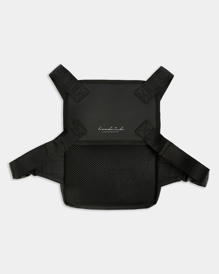 Back view of black chest body bag with Hoodrich white script logo