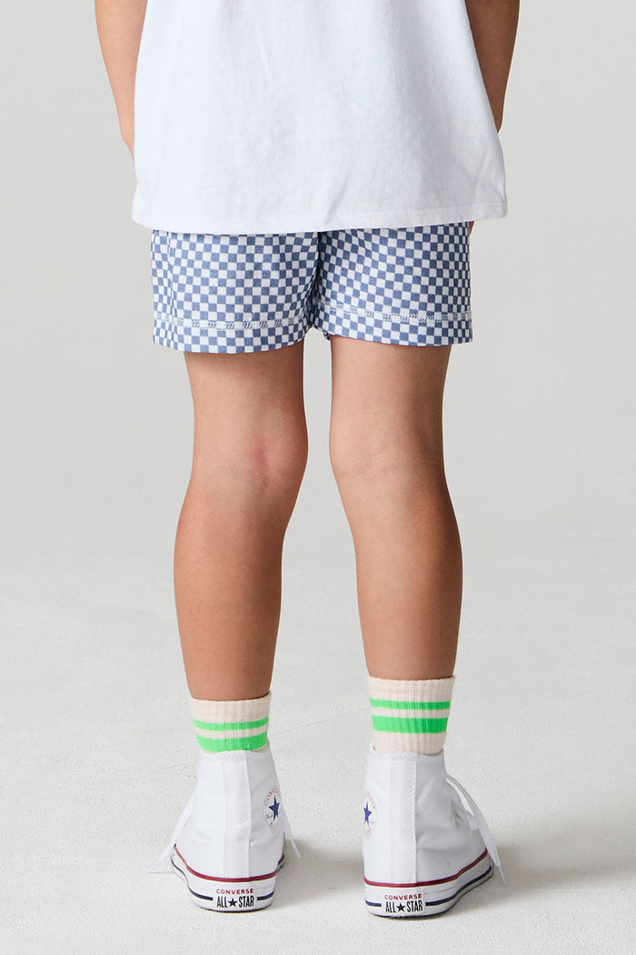 Back view of a boy wearing the Chaser  Cozy Beach Short on a neutral background