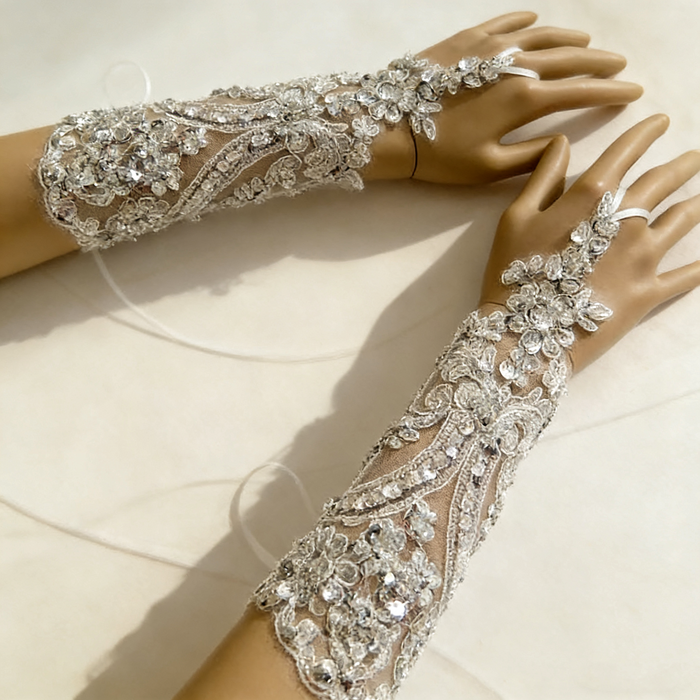 Rhinestone pearl beaded bridal gloves with crystal embroidery for an elegant wedding dress accessory.