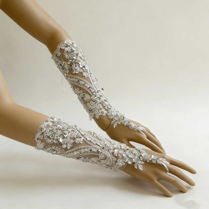 Rhinestone pearl beaded bridal gloves with crystal embroidery for an elegant wedding dress accessory.