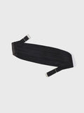 Black silk cummerbund with horizontal pleats, laid flat with buckle straps at each end.