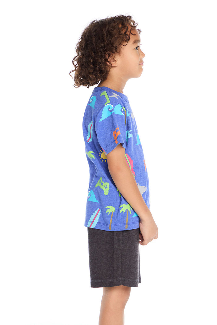 Side view of the Chaser Kids Cyber Surfer Tee in blue featuring colorful ocean and gaming graphics extending across the side