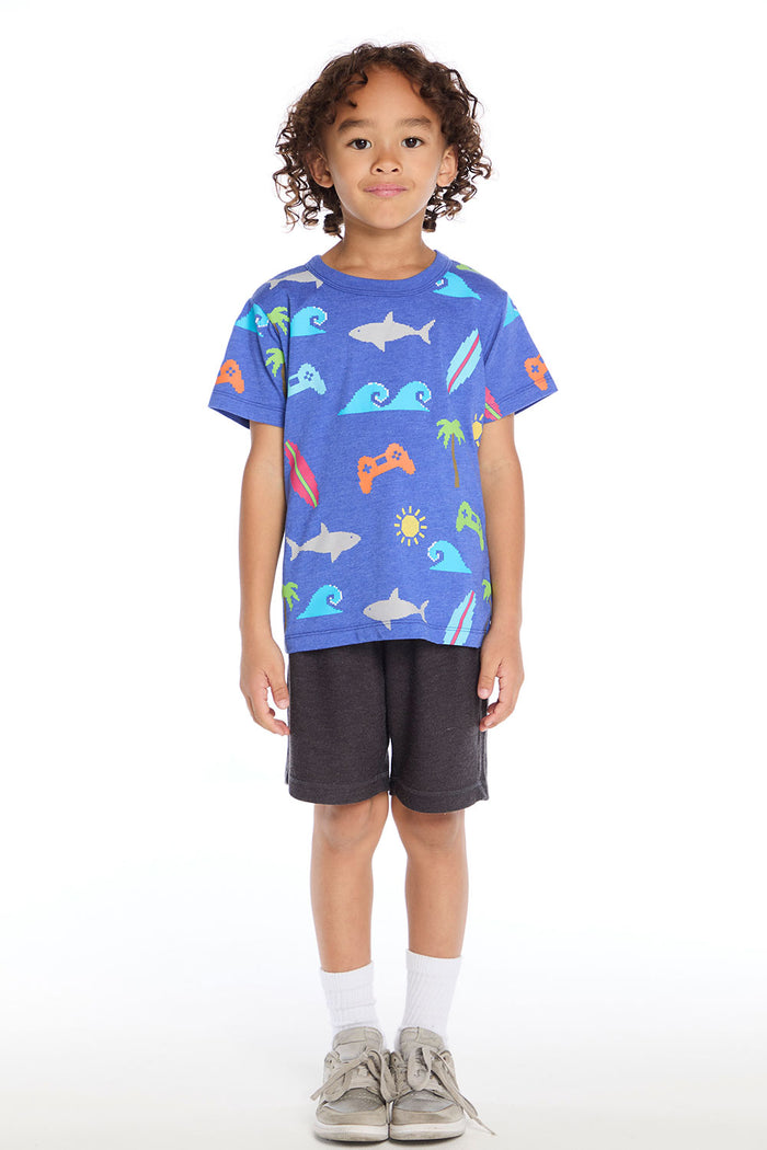 Full body view of the Chaser Kids Cyber Surfer Tee in blue with colorful ocean and gaming graphics shown with the Vintage Black Cozy Knit Cozy Beach Short on a white background