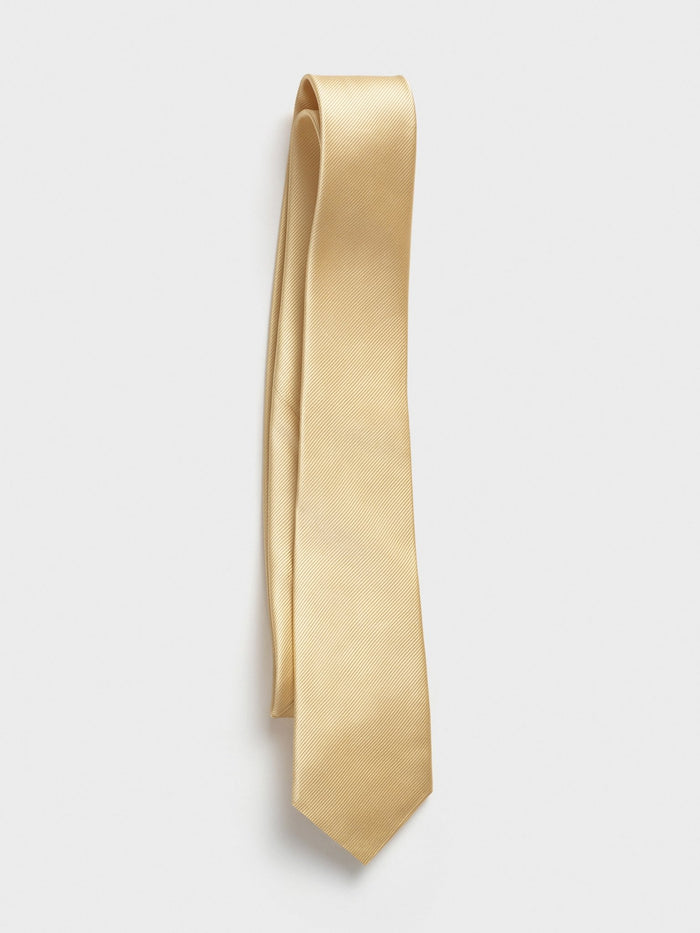 Daffodil silk necktie with twill texture, draped diagonally on a grey background.