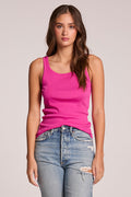 Front view of a woman wearing the Chaser   Daphne Electric Fuchsia Tank Top and jeans on a neutral background