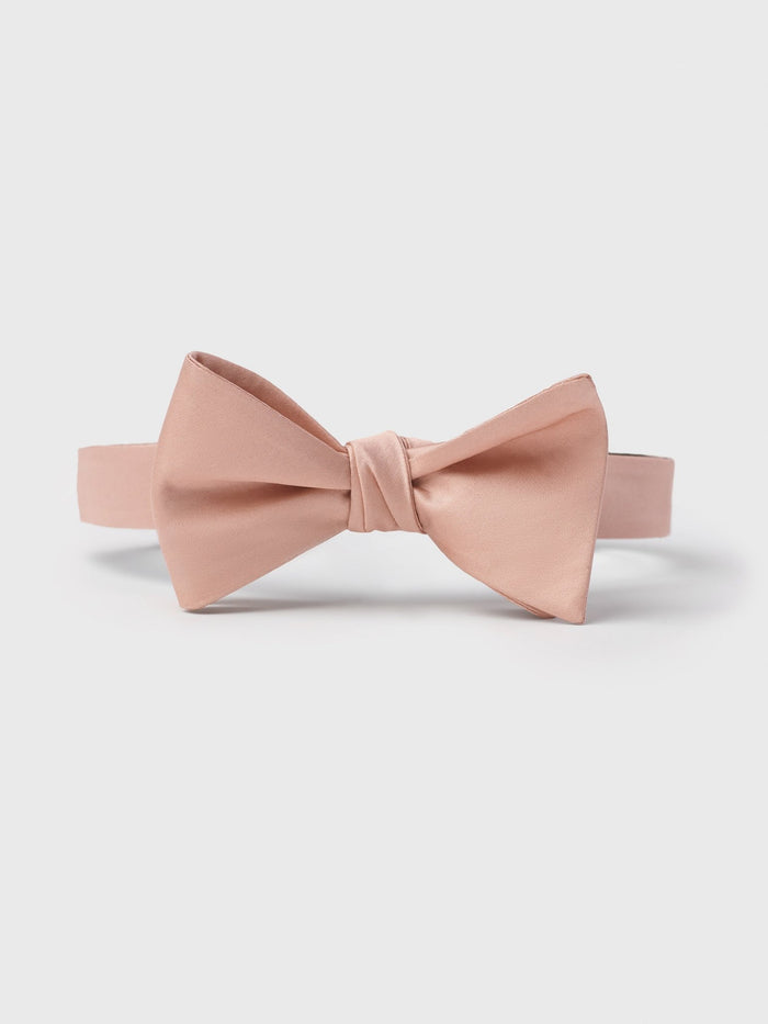 Peach satin butterfly bow tie, pre-tied, with adjustable neck strap.