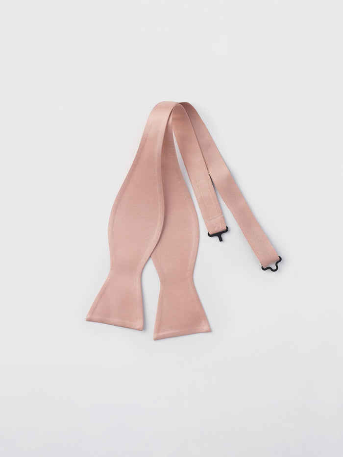 Peach satin butterfly bow tie shown untied and laid flat, with adjustable strap.