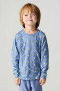 Front view of a boy wearing the Chaser Dino Bolts Boys Tee on a neutral background with matching blue pants