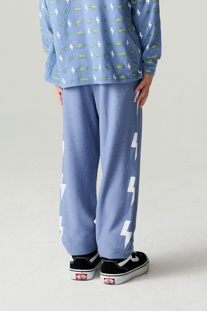 Back view of a boy wearing the Chaser Dino Bolts Pants Boys Jogger on a neutral background
