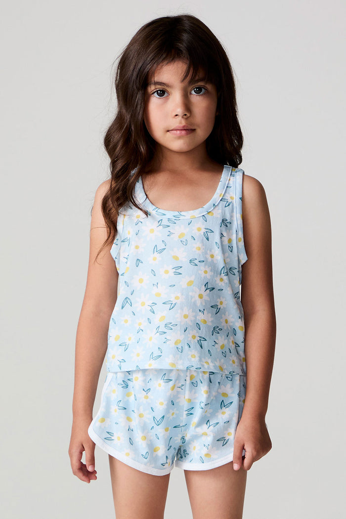 Front view of a girl wearing the Chaser Ditsy Daisies Tank and matching shorts on a neutral background