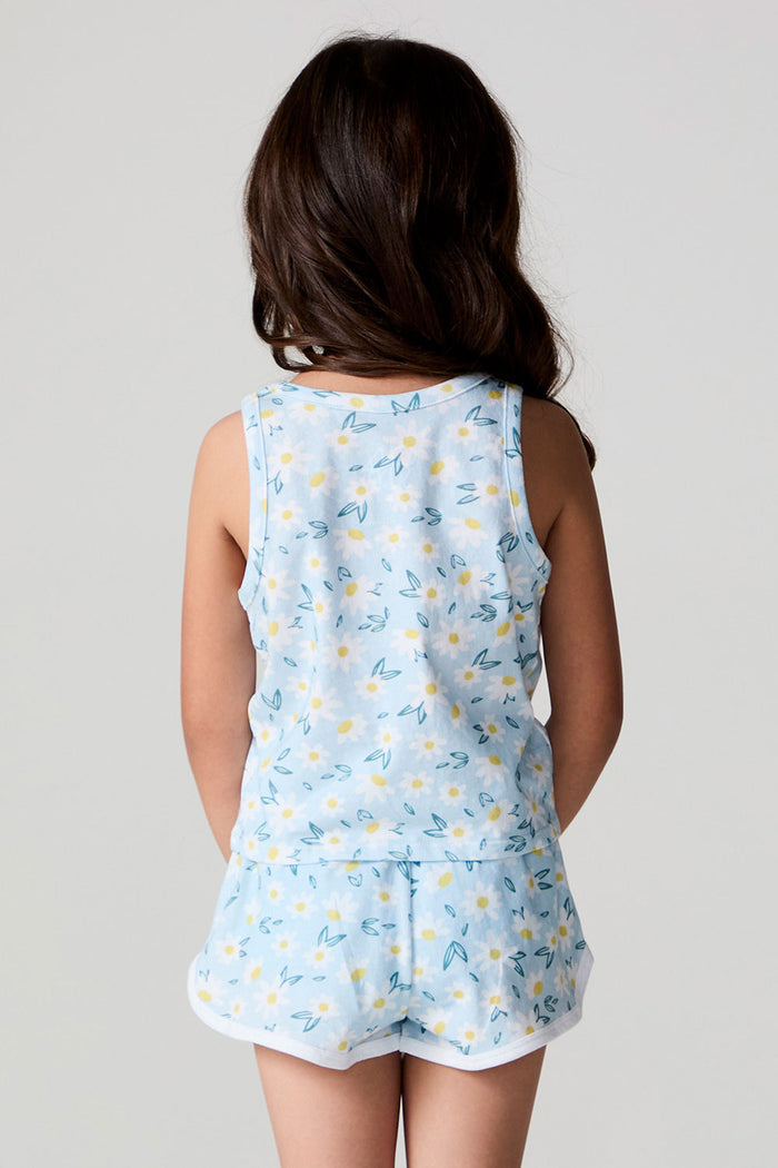 Back view of a girl wearing the Chaser Ditsy Daisies Tank and shorts on a neutral background