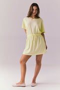 Chaser Dixie Panna Cotta Mini Dress featuring a drawstring waist and soft relaxed sleeves styled with blush flats