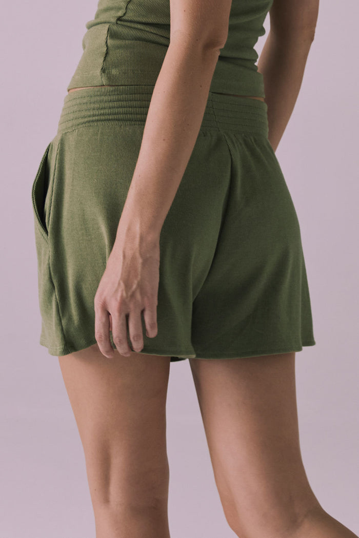 Back view of the Chaser Durango Meadow Green Shorts shown with the matching Brandi Meadow Green Tank, emphasizing the flattering cut and relaxed fit