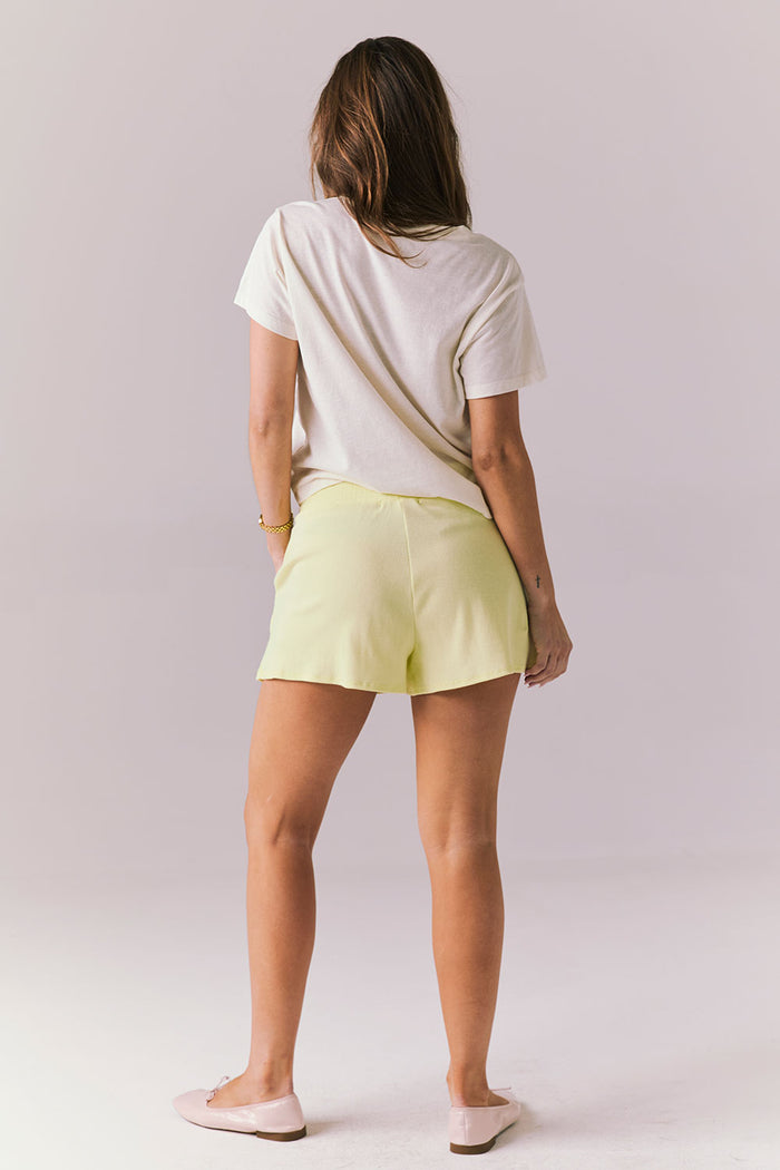 Back view of the Chaser Durango Panna Cotta Shorts paired with a cropped tee, showing the easy drape and flattering cut