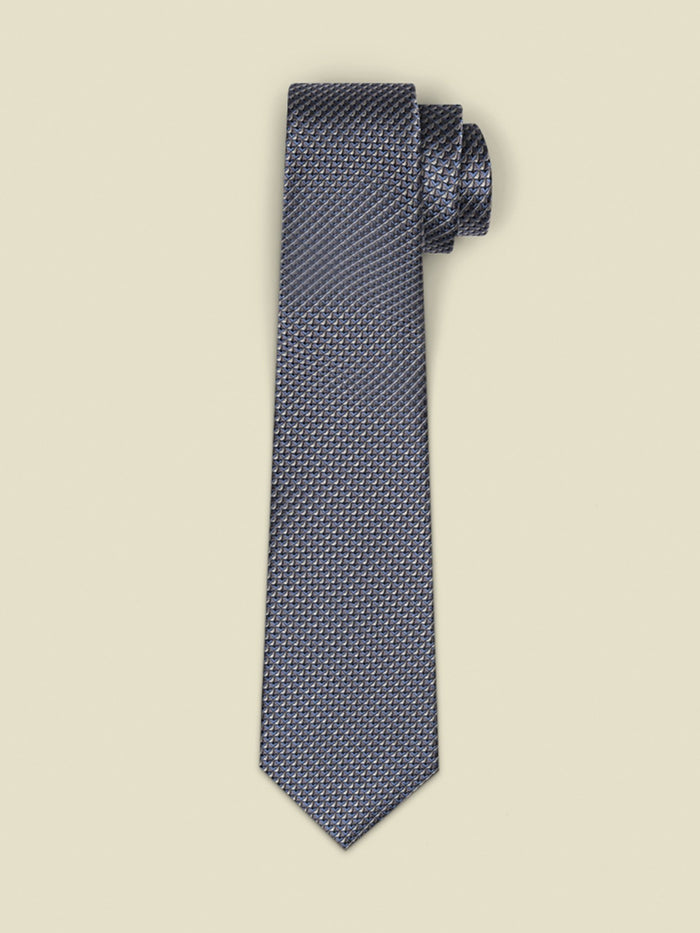Dusty blue and grey textured necktie, rolled at the top on a light background.