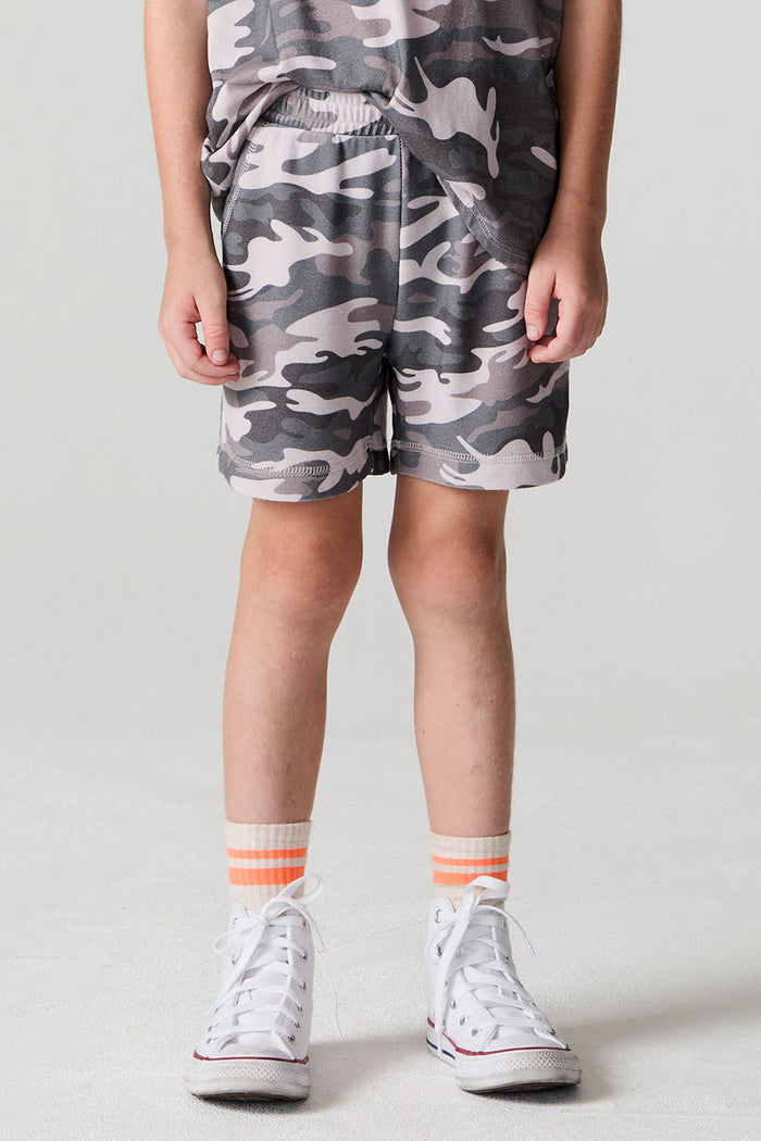 Front view of a boy wearing the Chaser Dusty Camo Shorts on a neutral background