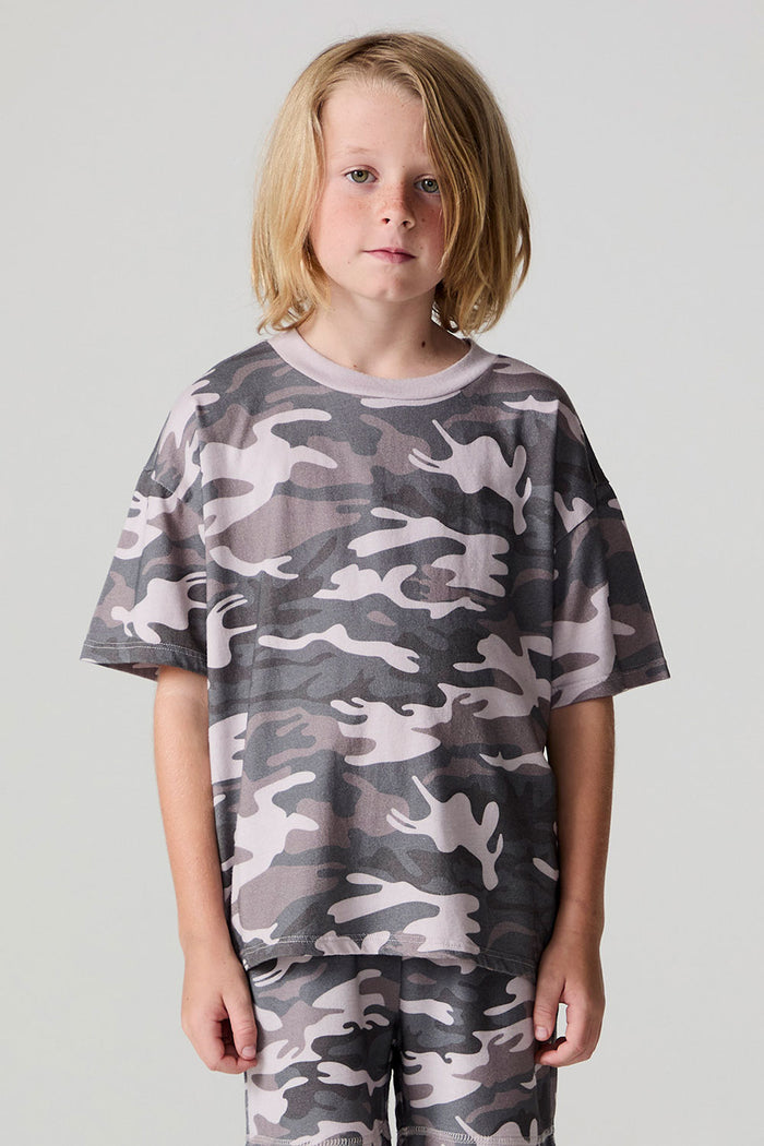 Front view of a boy wearing the Chaser Dusty Camo Tee  on a neutral background