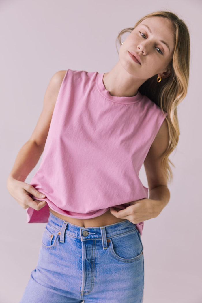 Close-up of the Chaser Eagle Bubblegum Tank showcasing the soft cotton fabric and sleeveless muscle cut in bright pink