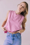 Close-up of the Chaser Eagle Bubblegum Tank showcasing the soft cotton fabric and sleeveless muscle cut in bright pink