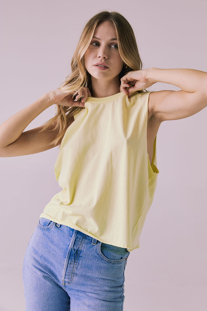 Close-up of the Chaser Eagle Panna Cotta Tank highlighting the clean crew neckline and lightweight cotton texture