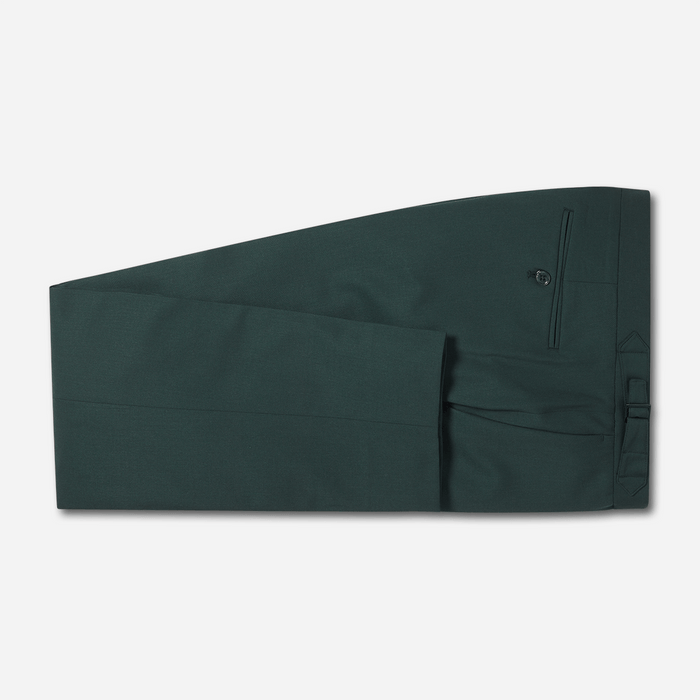 Emerald green tuxedo trousers folded flat, showing satin side stripe and side pocket.