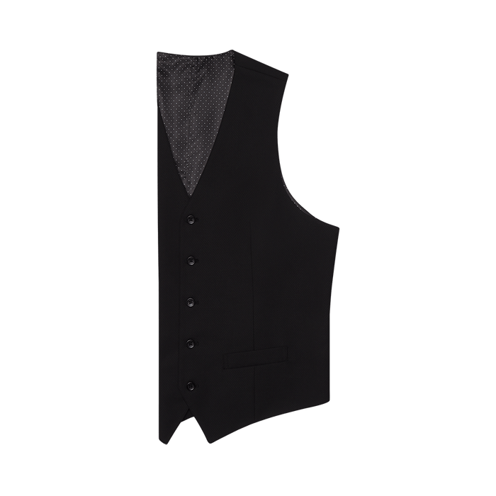 Black suit vest shown at an angle, revealing polka dot lining and buttons.