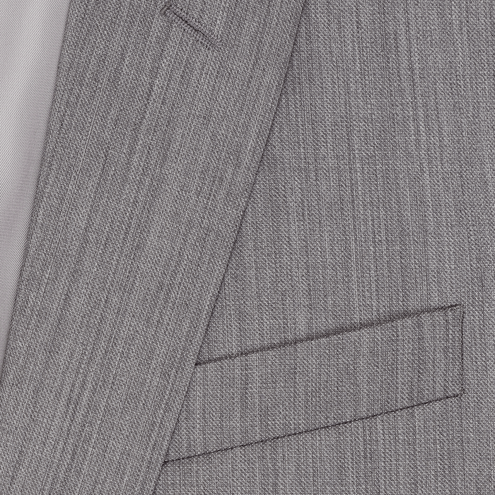 Close-up of sterling grey suit lapel and jacket pocket fabric texture.