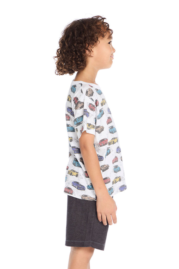 Side view of the Chaser Kids Fast Cars Tee in white featuring all-over colorful car graphics and short sleeves