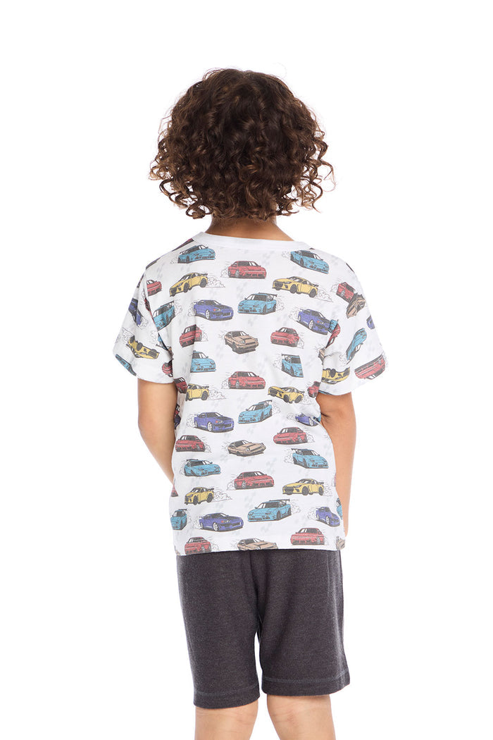 Back view of the Chaser Kids Fast Cars Tee in white with all-over colorful car graphics continuing across the back