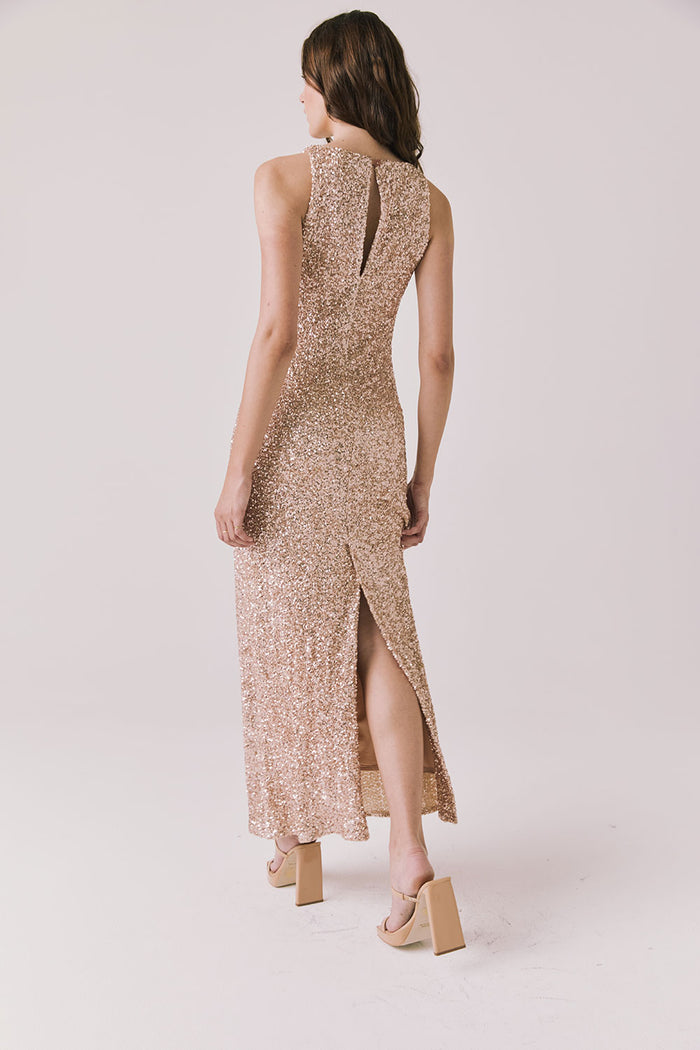 Full body back view of woman wearing Chaser’s Faye Bronze Brown Dress on a white background