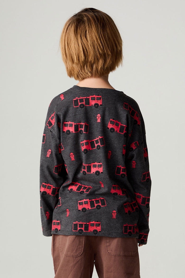 Back view of a boy wearing the Chaser Fire Trucks Boys Tee on a neutral background with arms lowered