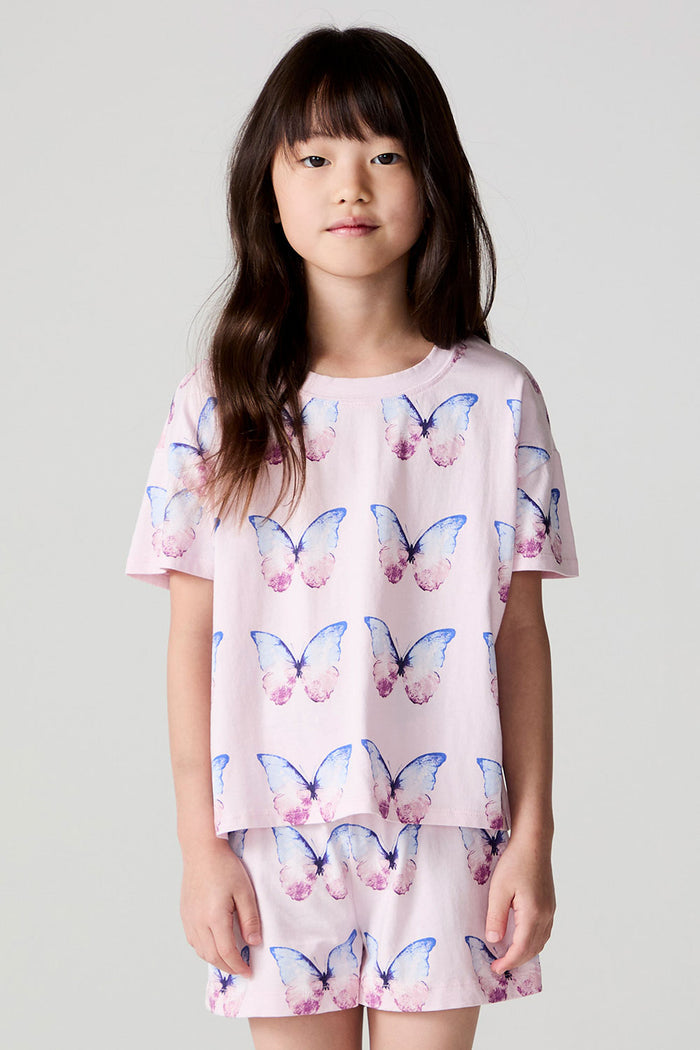 Front view of a girl wearing the Chaser Flutter Butterfly Tee on a neutral background