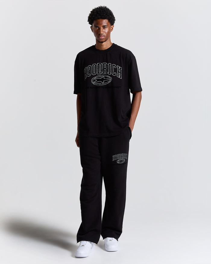 Person wearing a black 'Hoodrich' t-shirt and pants on a white background