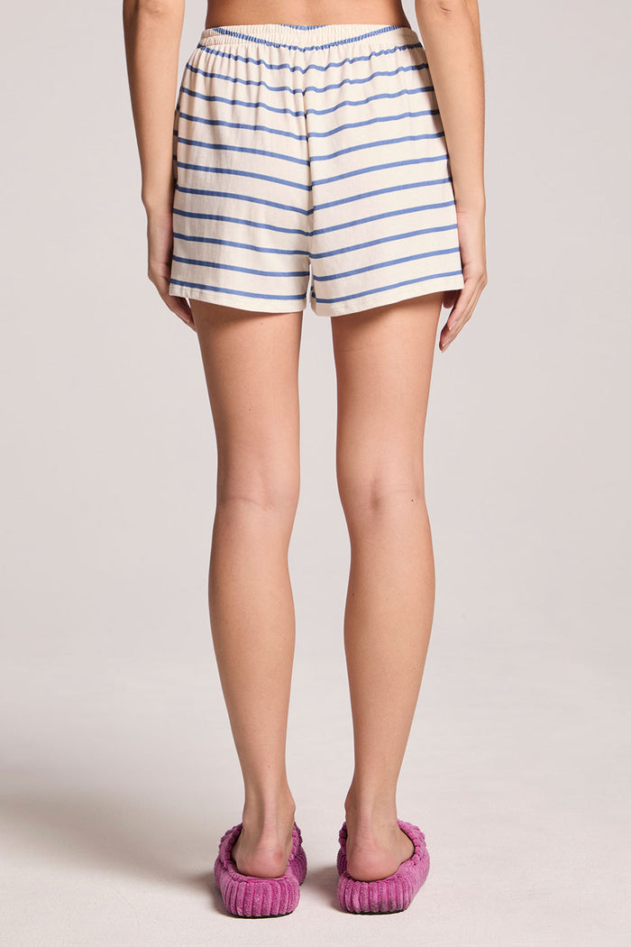 Back view of a woman wearing the Chaser French Riviera Stripe Harper Shorts