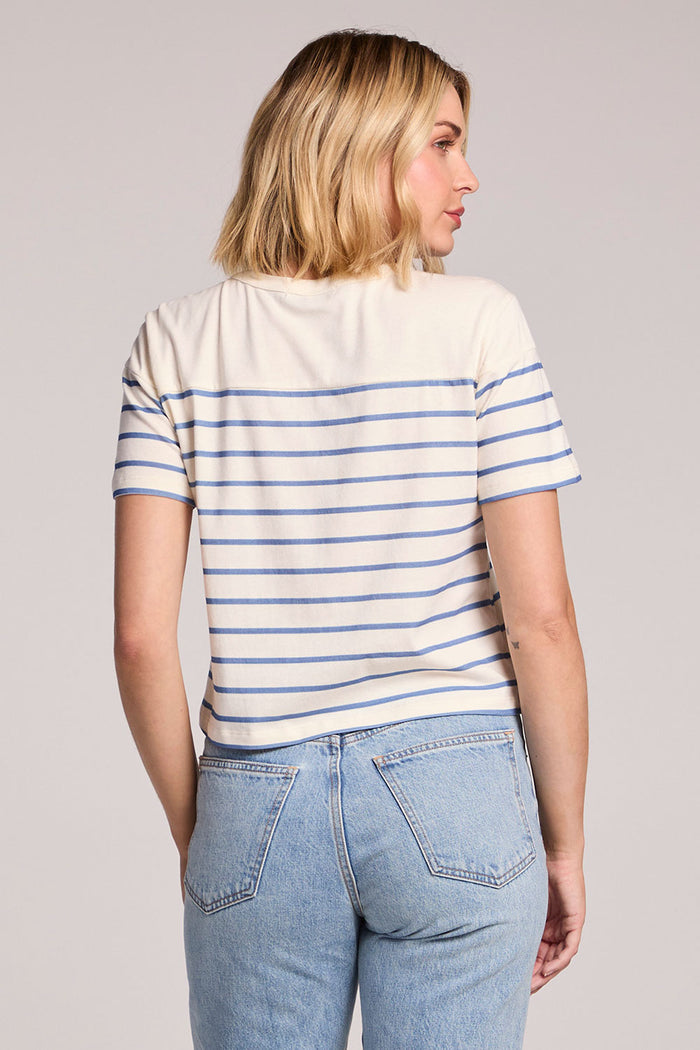 Back view of a woman wearing the Chaser French Riviera Stripe Jameson Tee on a neutral background