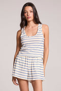Front view of a woman dressed in the Chaser French Riviera Striped Siren tank on a neutral background