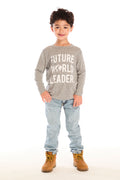 Full body view of boy wearing Chaser’s Future World Leader gray long sleeve top with jeans and boots on a white background
