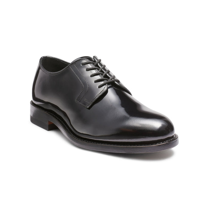 Black patent leather lace-up derby shoe, three-quarter angle view.