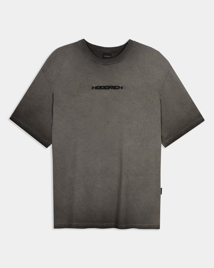Oversized black oil wash t-shirt featuring a center chest Hoodrich logo.