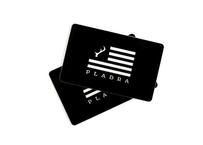 Two black Gift Card cards with a white logo—a stylized antler and stripes above "PLADRA"—are stacked, one overlapping the other. Give the gift of choice with convenient email delivery.