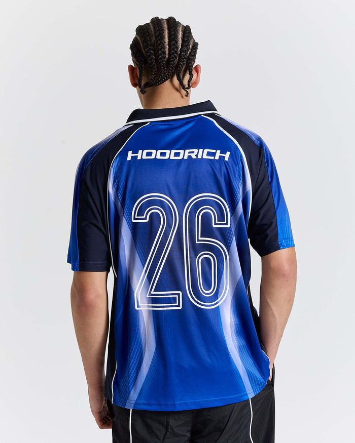 Person wearing a blue sports jersey with 'Hoodrich' branding and number 26 on a white background