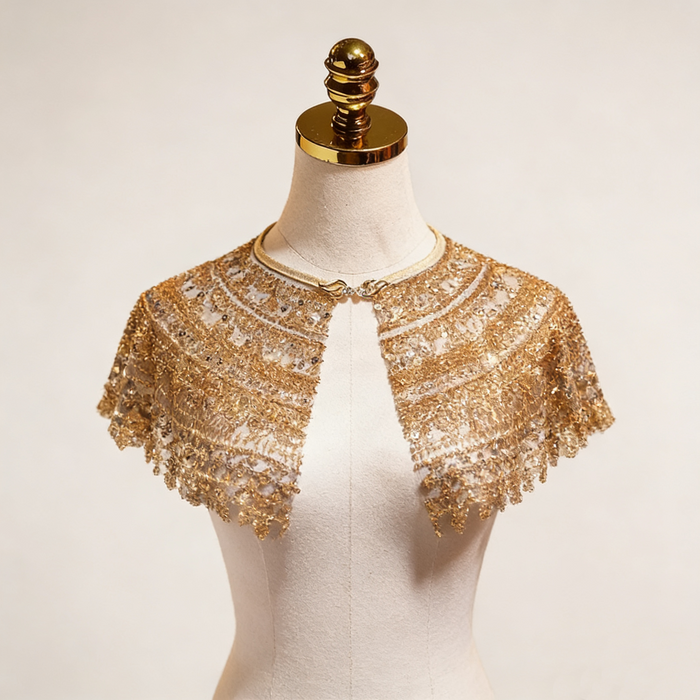 Champagne gold sequin bridal capelet with hand embroidered bead details, luxury short wedding shawl for bridal gown.