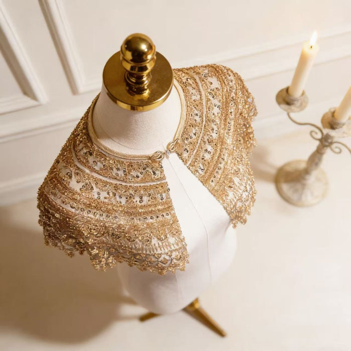 Champagne gold sequin bridal capelet with hand embroidered bead details, luxury short wedding shawl for bridal gown.