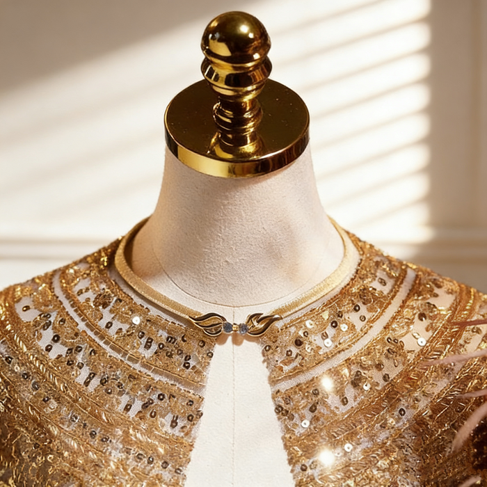 Champagne gold sequin bridal capelet with hand embroidered bead details, luxury short wedding shawl for bridal gown.