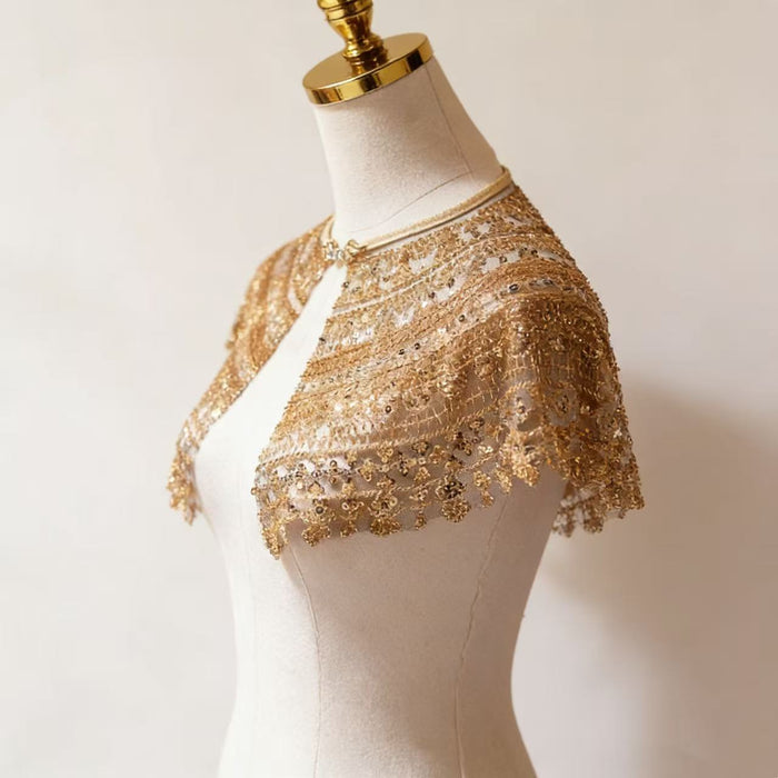 Champagne gold sequin bridal capelet with hand embroidered bead details, luxury short wedding shawl for bridal gown.