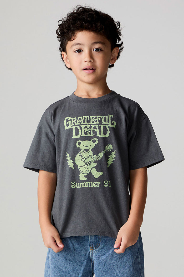 Front view of a boy wearing the Chaser Grateful Dead Tour Tee on a neutral background