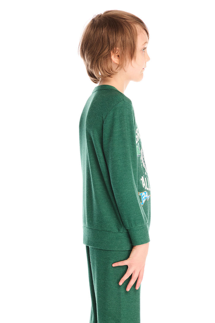 Side view of boy wearing Chaser’s Greatest Of All Time Everest Green long sleeve top with text graphic on a white background