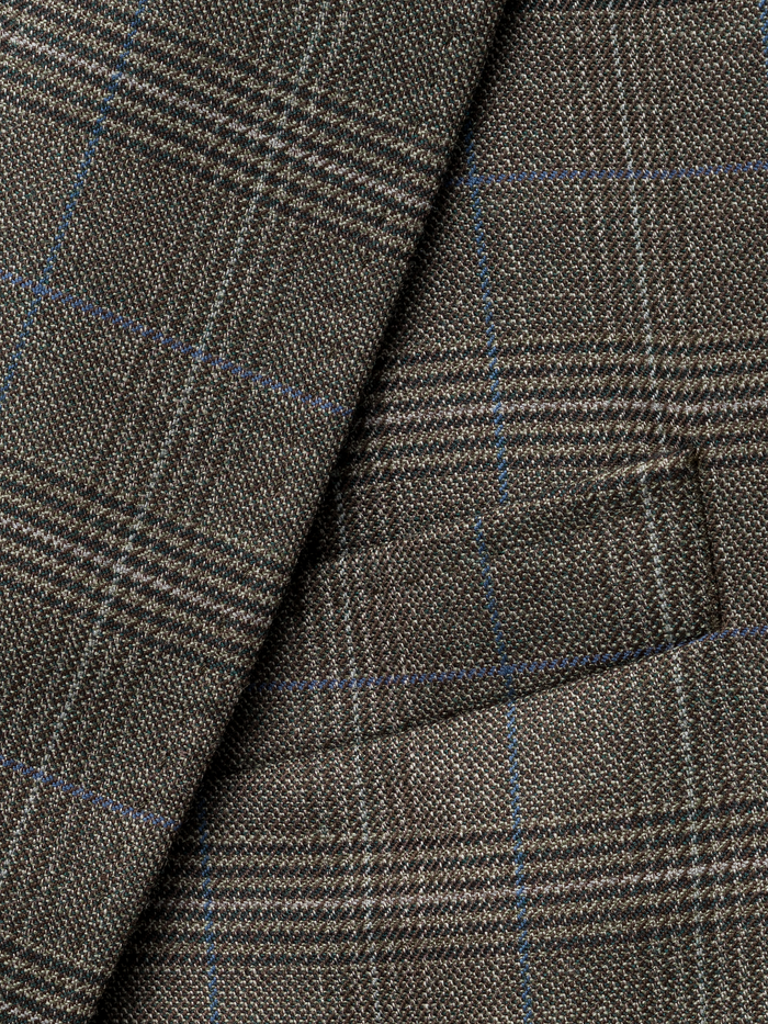 Close-up of grey plaid sportcoat lapel and welt pocket.